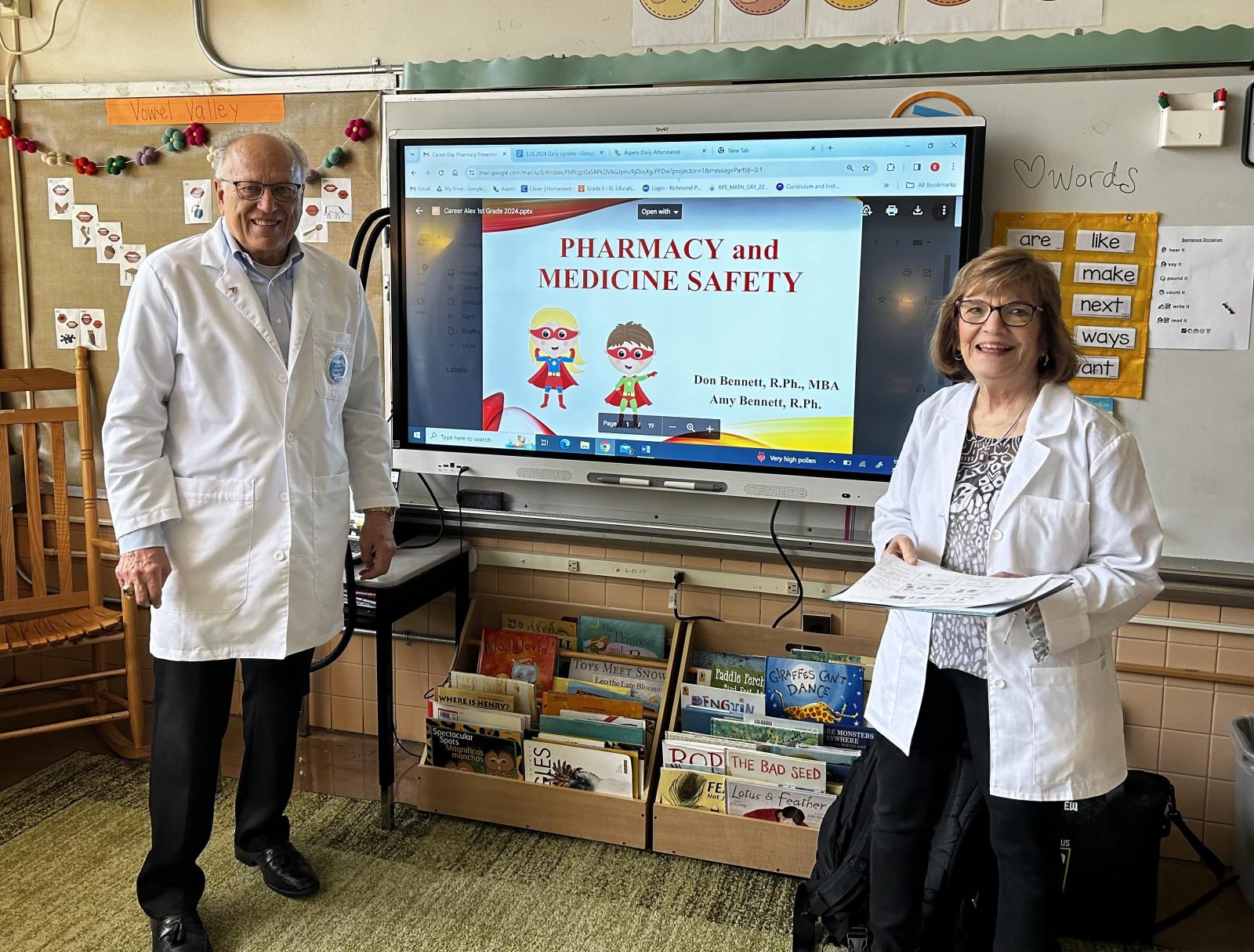 don and amy bennett in their grandon's classroom